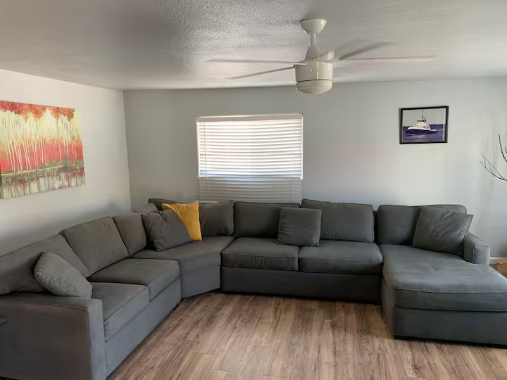 Living room with dining area at The Haven River Lodge rental
