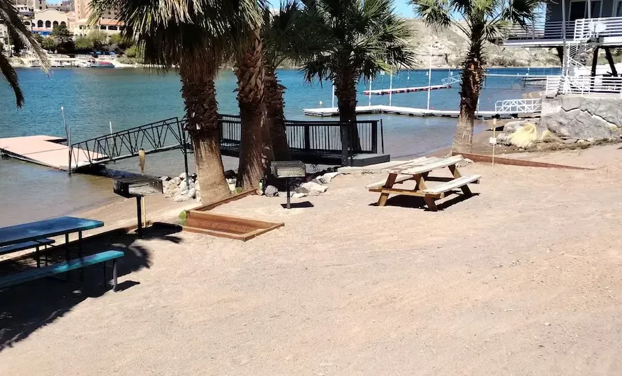 Riverfront view with dock at The Haven River Lodge