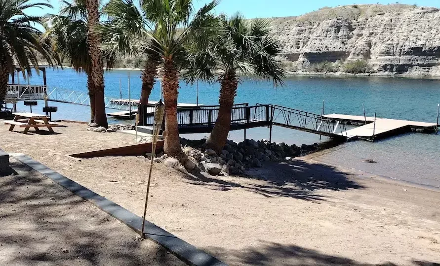 Riverfront view with dock at The Haven River Lodge