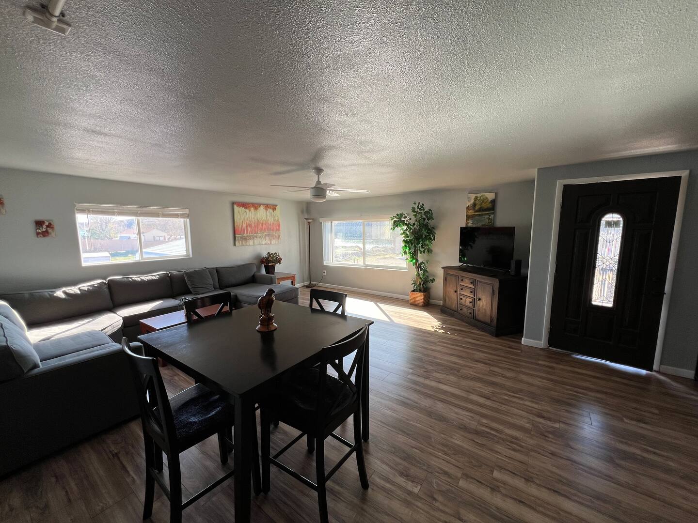 Living room with dining area at The Haven River Lodge rental