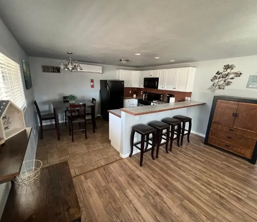 Open kitchen and dining area at The Haven River Lodge rental