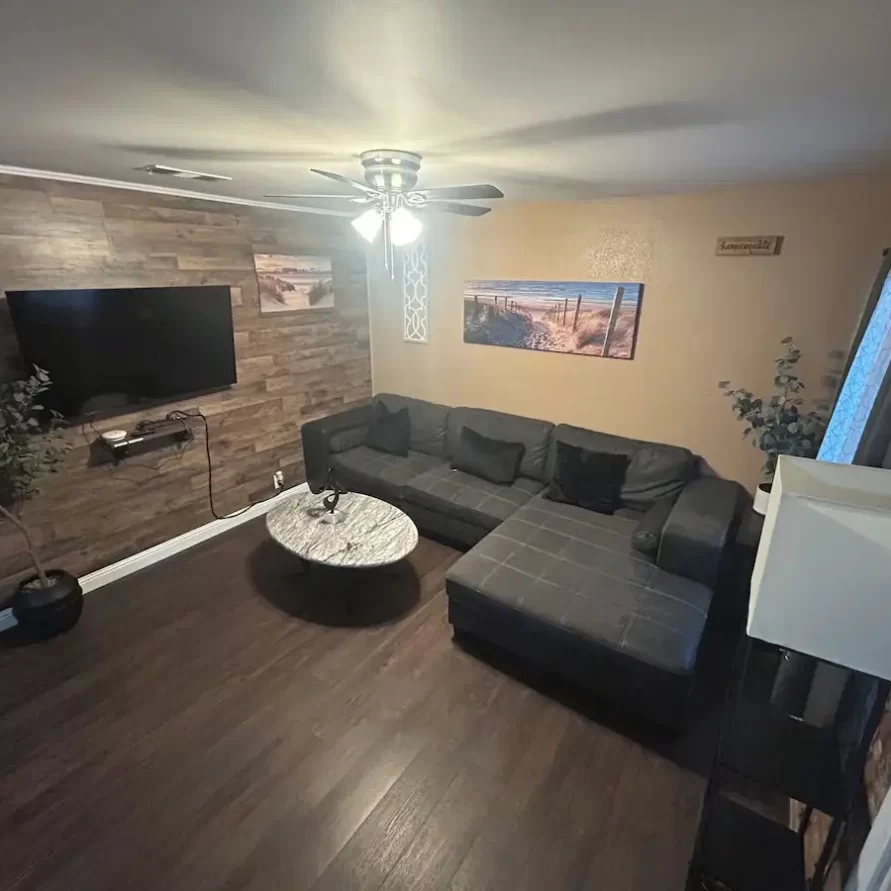 Living room with dining area at The Haven River Lodge rental