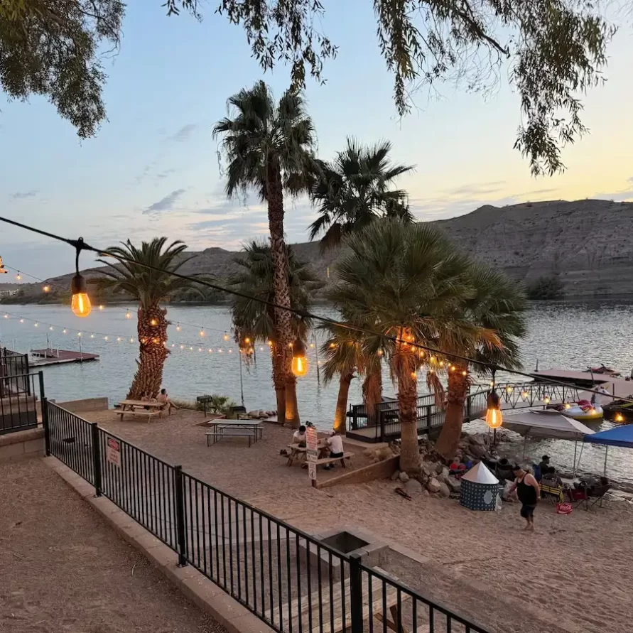 Picnic area with palm trees at The Haven River Lodge, Bullhead City AZ