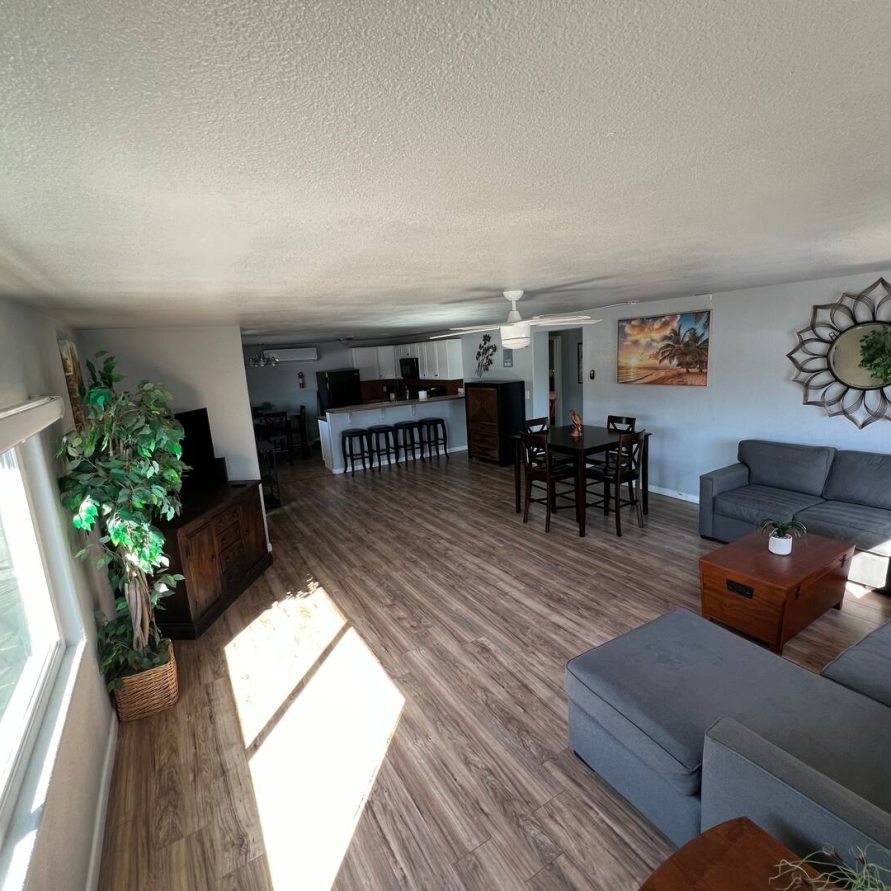 Living room with dining area at The Haven River Lodge rental