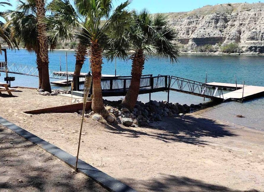 Riverfront view with dock at The Haven River Lodge